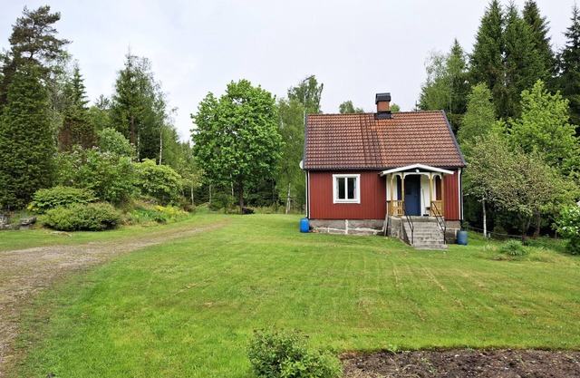 Charming Holiday Home in Forest Idyll near Tosthult | SE01078
