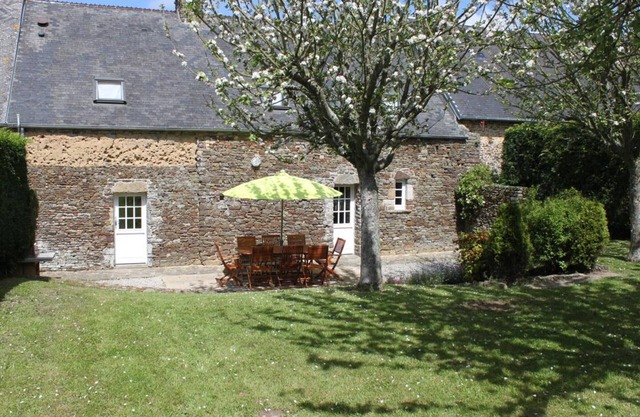 Charming Home Near Portbail Beaches, Enclosed Yard, Fireplace, and Garage