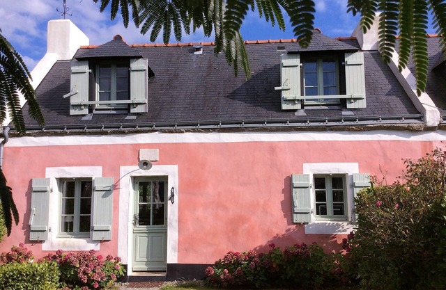Charming house with south and west terraces. Small enclosed garden.
