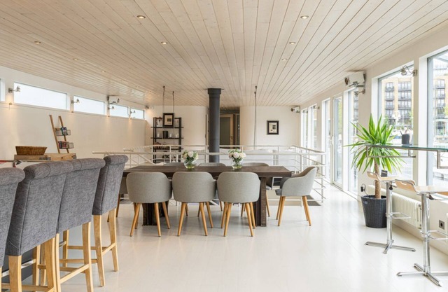 Charming houseboat featuring a sauna