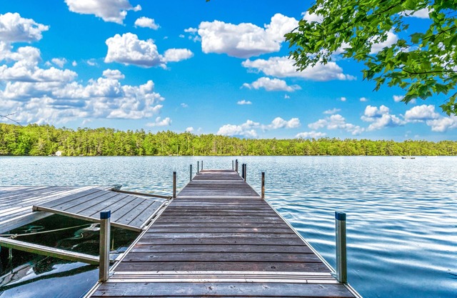Charming lakefront cabin with private dock, deck & screened porch