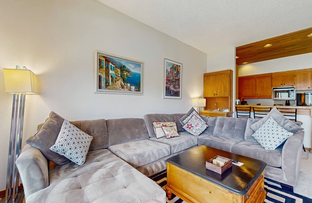Charming Lakefront Condo with a Shared Pool and Hot Tub, Dock, and Free WiFi