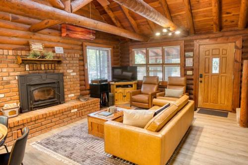 Charming Log Cabin in Tall Pines with Fire Pit Near Trails & Lake