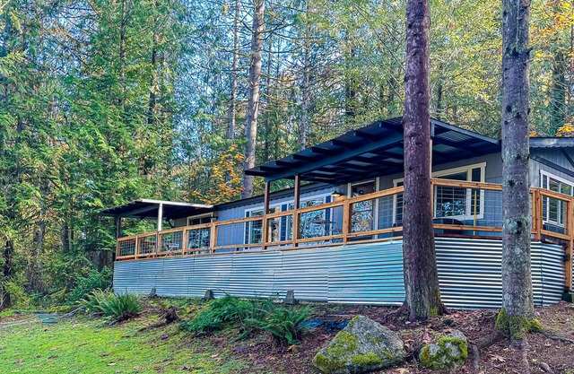 Charming modern farmhouse with water views, fire pit, bbq grill