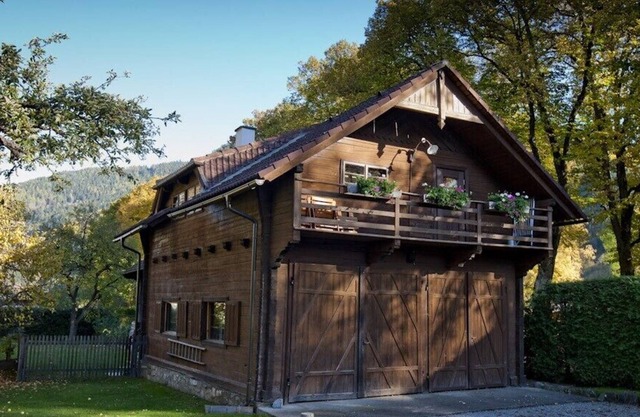 Charming old wooden house, surrounded by a large garden