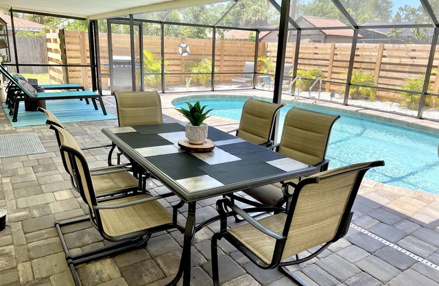 Charming Poolside Oasis- with heated pool-7 min to beach