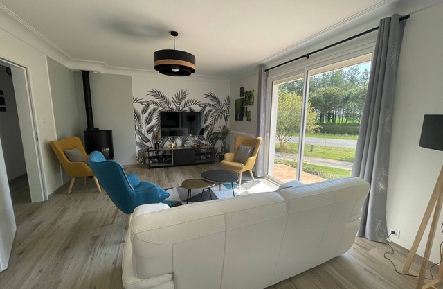 Charming Renovated Home with Private Pond, Terrace, and Modern Amenities Near Beach