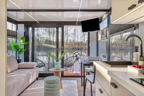 Charming Tiny Houseboat Escape Near Amsterdam by Weltevreden Experience
