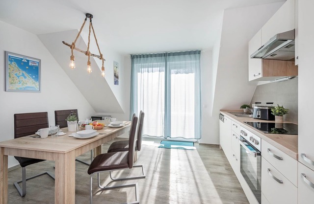 Charming vacation apartment in Loddin with garden, WLAN & barbecue - quiet, close to the beach, m