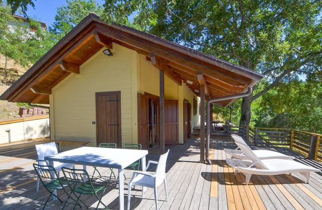 Charming wooden house, situated on a hill, between Florence and San Marino.
