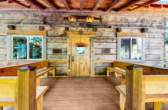 Charming woodland cottage with 2 covered porches, wood stove, treehouse, firepit