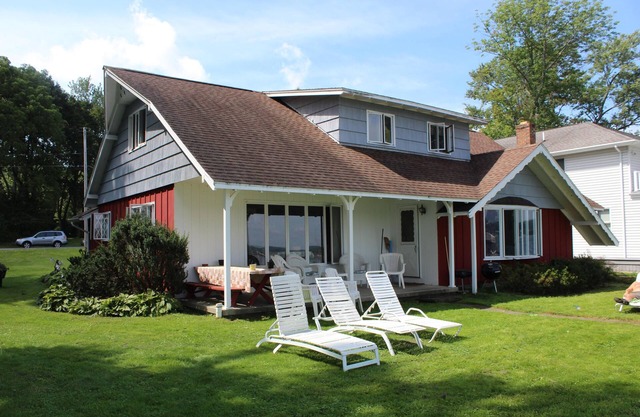 Chautauqua lakefront living on spacious double lot with dock, boat tie-up & more