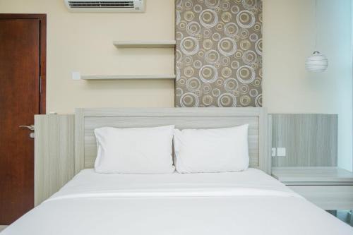 Chic and Spacious 2BR Apartment at Brooklyn Alam Sutera By Travelio