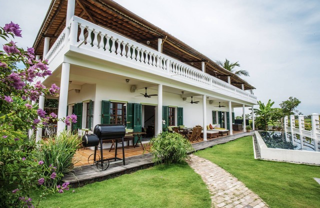 Chic French Colonial Villa in the rice fields
