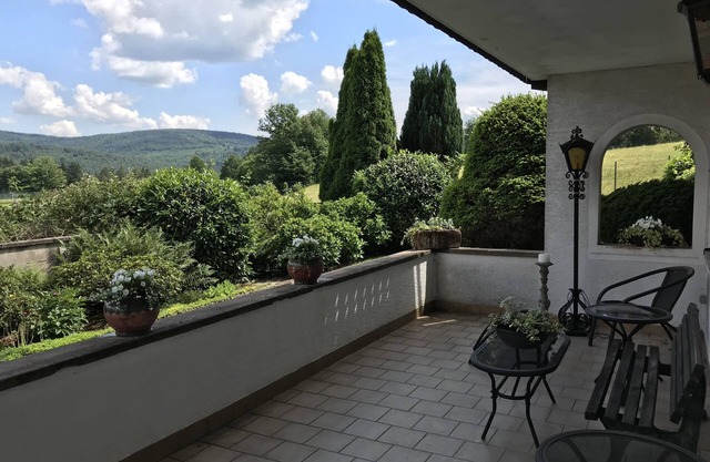 Chic furnished apartment in a beautiful location with gardens and a view.
