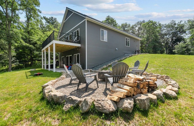 Chic Lakefront Escape- Hot Tub, Pier, & Kayaks