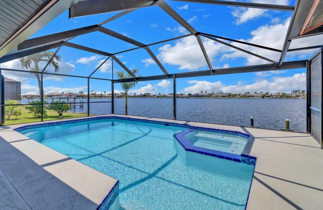 Chic Remodel! Gulf-Access Waterfront! Heated Pool, Kayak, Bikes & Over $125 of Free Daily Activities