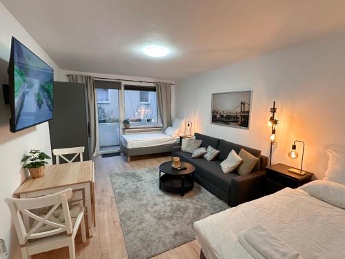 City Apartment with 2 individual beds and sleeping sofa and kitchen