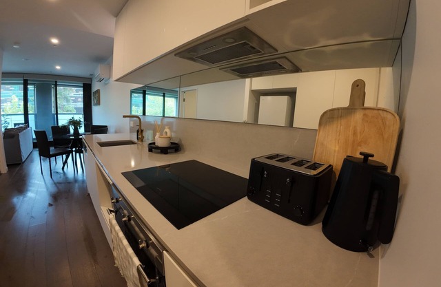 City Retreat with Rooftop Pool, Private Parking & City Views