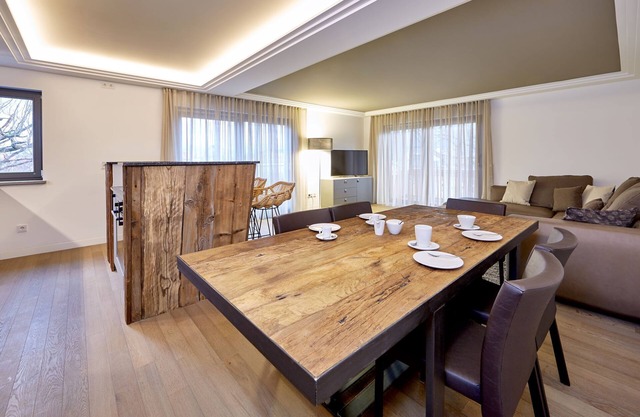 City suites murnau- Suite 8 to 5 pers., 2nd floor, large south-facing balcony, BBQ, WLAN, SAUNA HAUS