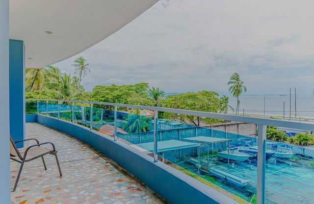 Coastal condo with sea views, balcony & resort amenities