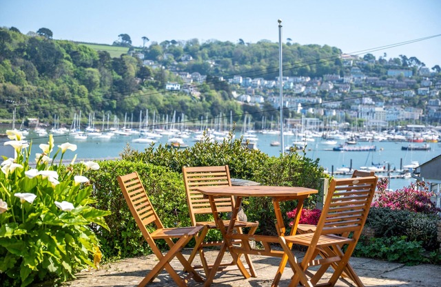 Coastal Escape: River Views, Terrace & Parking