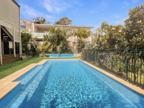 Coastal Upper-Level Home with Shared Pool Access