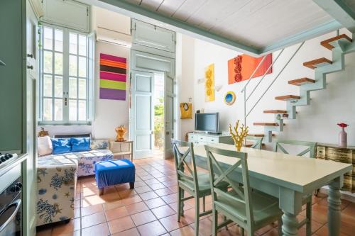 Colors House On The Beach by Pleiades Home