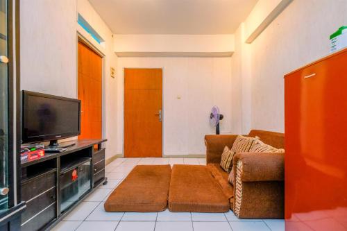 Comfort and Cozy Living 2BR at Cibubur Village Apartment By Travelio