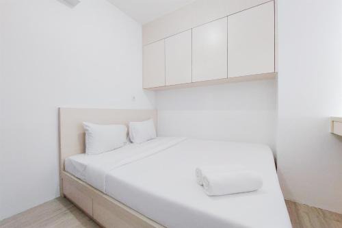 Comfort and Modern Look 2BR Loftvilles City Apartment By Travelio