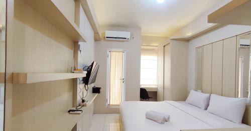 Comfort Studio at Candiland Apartment By Travelio