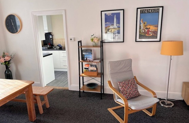 Comfortable and spacious upper-floor maisonette with garden by the sea.