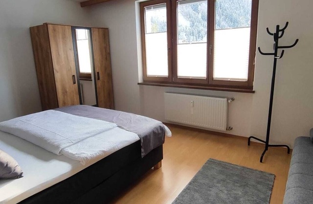 Comfortable apartment with cozy tiled stove