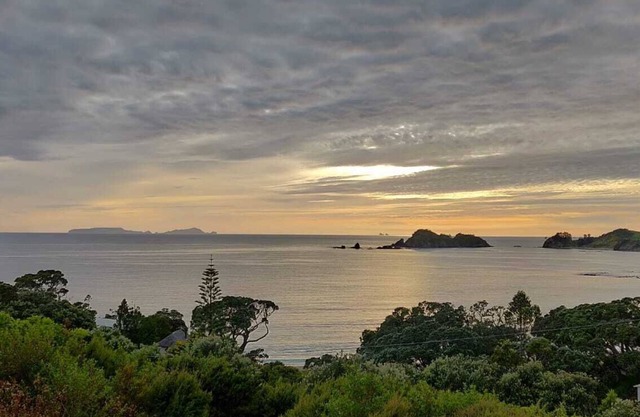 Comfortable bach with stunning views over a beautiful beach