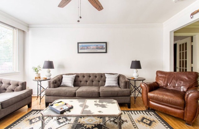 Comfortable home close to everything w/private deck/yard, well equipped kitchen.