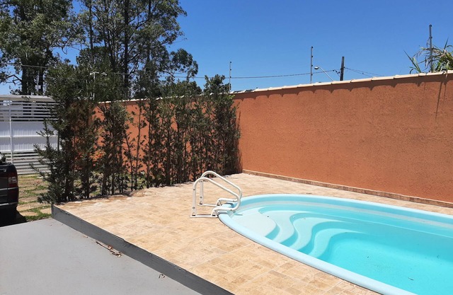 Comfortable house with pool and garden in Peruíbe
