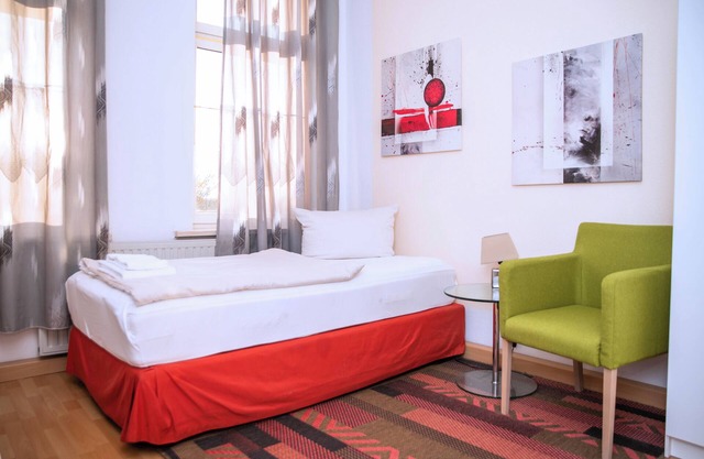 Comfortable single room with shared bathroom