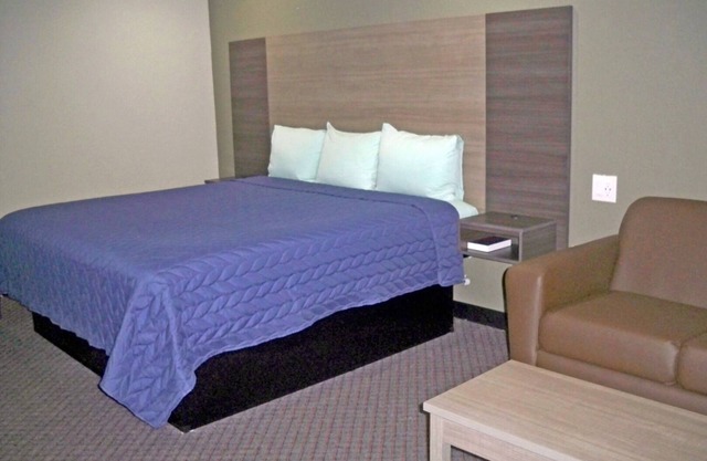Comfortable & Spacious Room: Mini-Fridge, Flat Panel TV & Free Breakfast