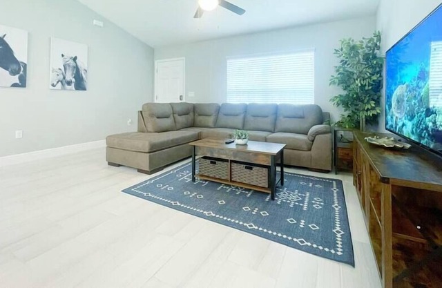 Comfy and Cozy 4 bedroom home with garage
