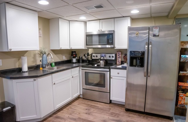 Complete serenity on this 5.5 acre modern waterfront property.