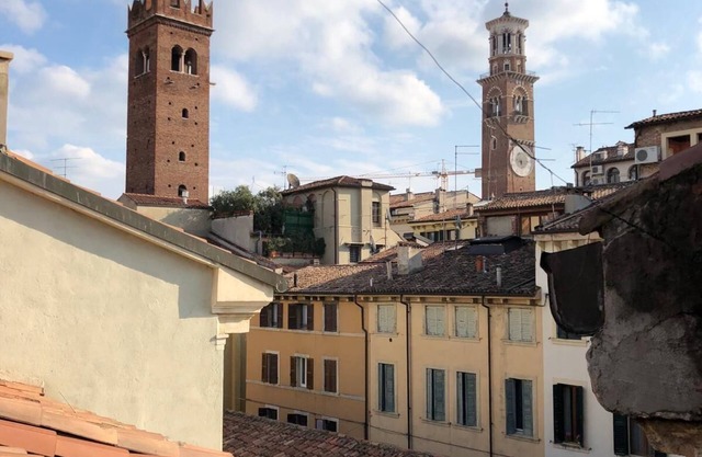 Completely renewed apartment with balcony and view on Verona's towers