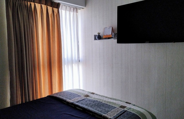 Confortable Habitación con Baño Privado en Casa de Familia