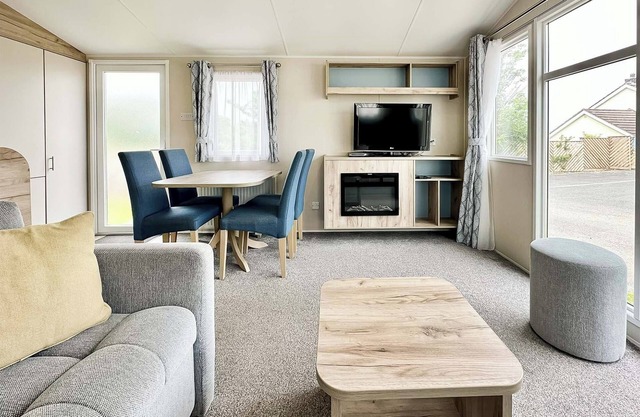 Contemporary 12ft-wide caravan with one double and one twin.