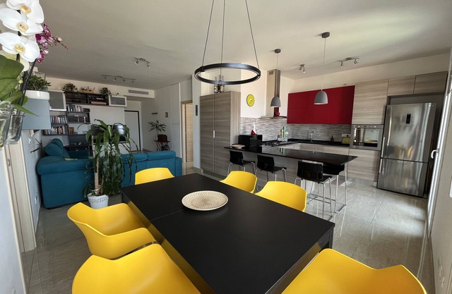 Contemporary apartment in the beating heart of Bologna with amazing skyline view