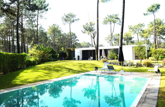 Contemporary style villa, pool, overlooking golf fairway, near stunning beaches
