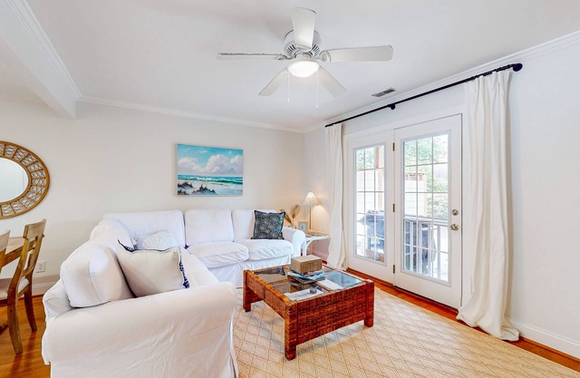Contemporary townhome with patio, grill, balcony, W/D, & walkable location