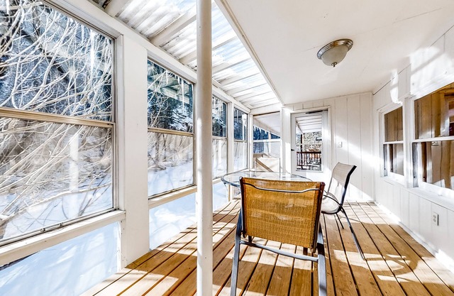 Convenient cabin right on the river w/partially enclosed deck, and gas grill