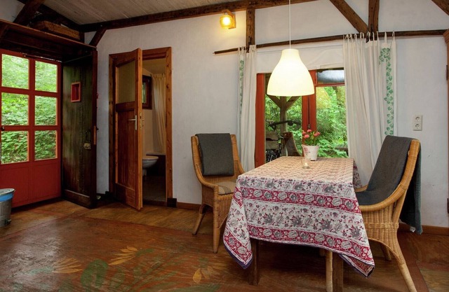 Cosily furnished small wooden house.