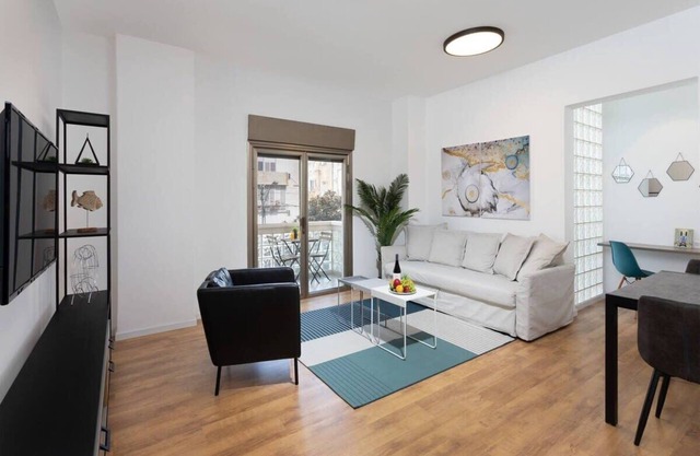 Cosy 1BR with Balcony Near Hilton Beach by HolyGuest