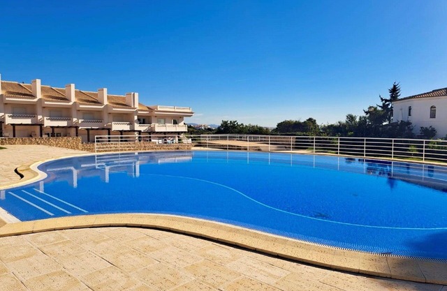 Cosy apartment for 4 guests with WIFI, A/C, pool, TV, terrace and parking